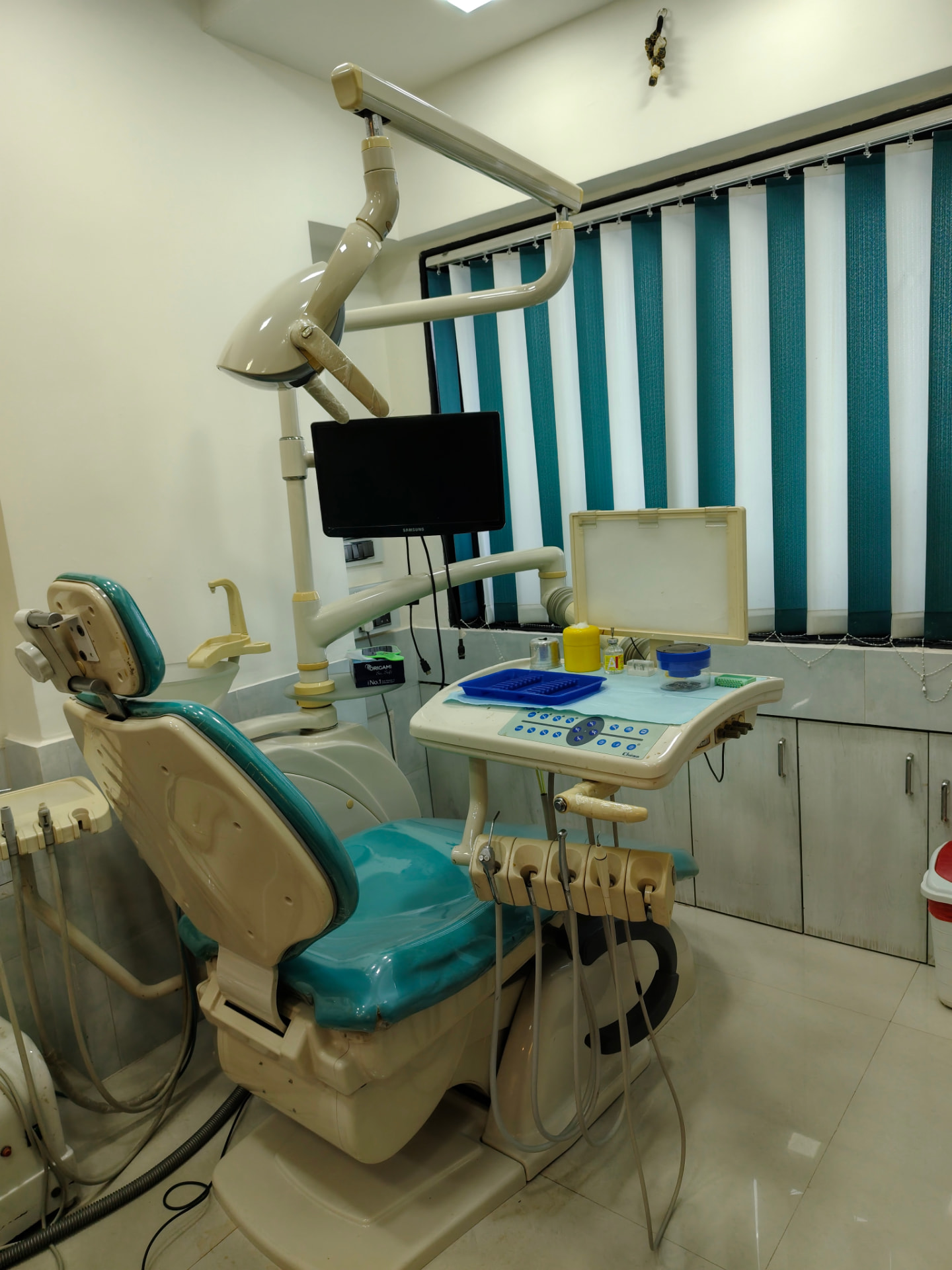Dental chair and equipment at Rachana's Dental Clinic